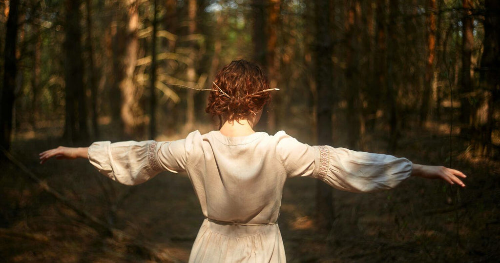 How Cacao Helps meReturn to Balance. Redhead lady returning to balance in a forest setting.