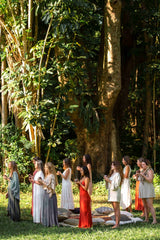 A cacao ceremony taking place in a beautiful nature location with Sacred Earth Medicine Ceremonial Cacao