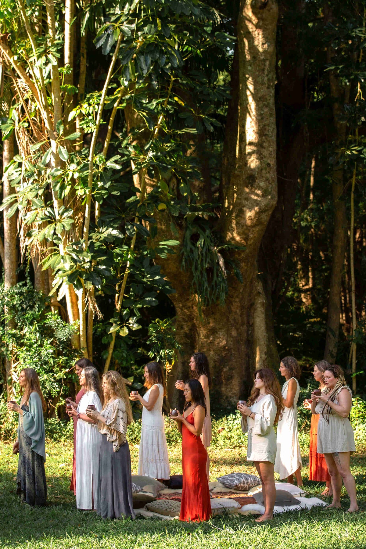 A cacao ceremony taking place in a beautiful nature location with Sacred Earth Medicine Ceremonial Cacao