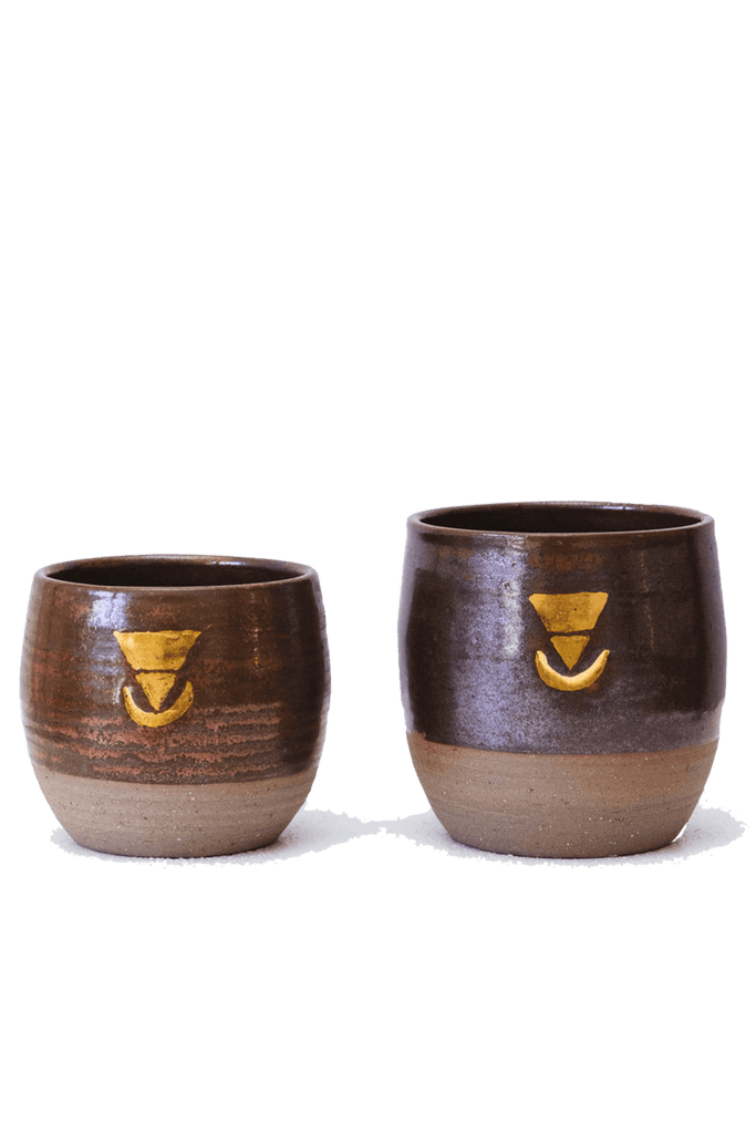 Two hand made Ceremonial Cups, showing both regular (6oz) and large (8oz) sizes. These cups are made from clay that is wild harvested using methods taught by local indigenous people from Mt Jerusalem in the Northern Rivers region of NSW. These cups are made with an enormous amount of love and care. They are definitely the sacred vessel to consume a real ceremonial cacao from!