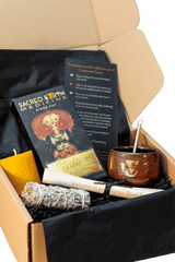 Unboxing the Starters Pack Ritual Box. The ritual box includes a 400g block of Sacred Earth Medicine Ceremonial Cacao, a small ceremonial cup, asgae stick to smudge yourself, a candle for ceremony, a preparation card for preparing your first ceremonial cacao, a cacao deva invocation card and a scroll to enable you to enjoy your first cacao ceremony
