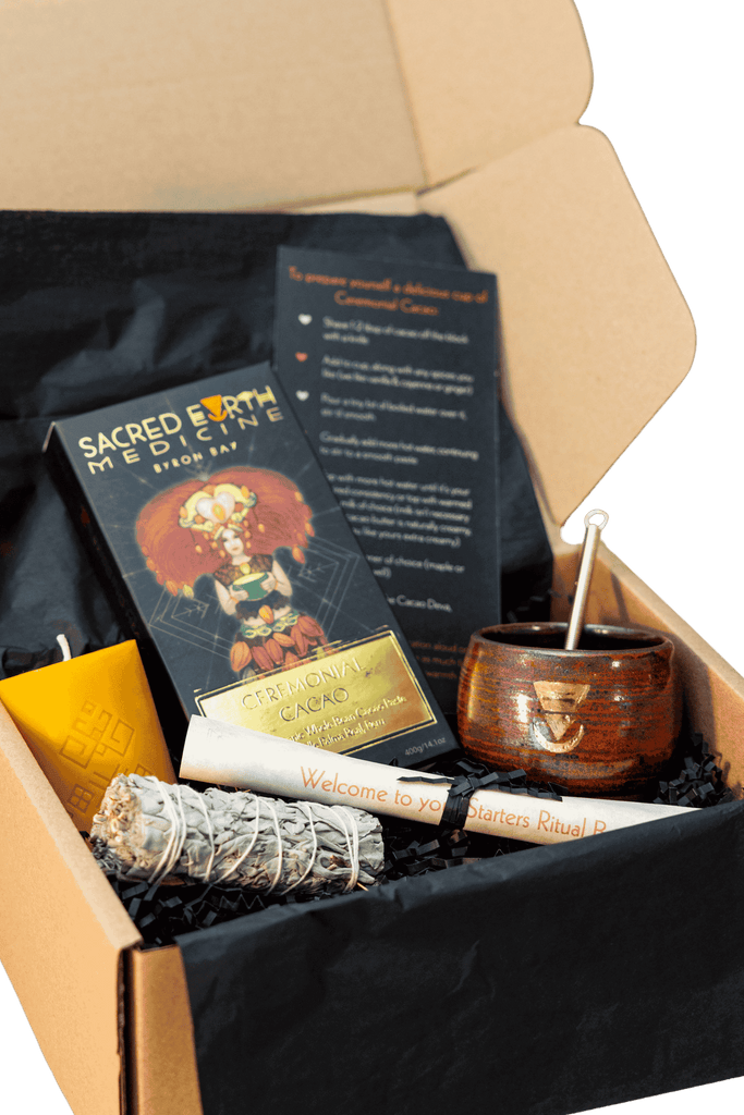 Unboxing the Starters Pack Ritual Box. The ritual box includes a 400g block of Sacred Earth Medicine Ceremonial Cacao, a small ceremonial cup, asgae stick to smudge yourself, a candle for ceremony, a preparation card for preparing your first ceremonial cacao, a cacao deva invocation card and a scroll to enable you to enjoy your first cacao ceremony